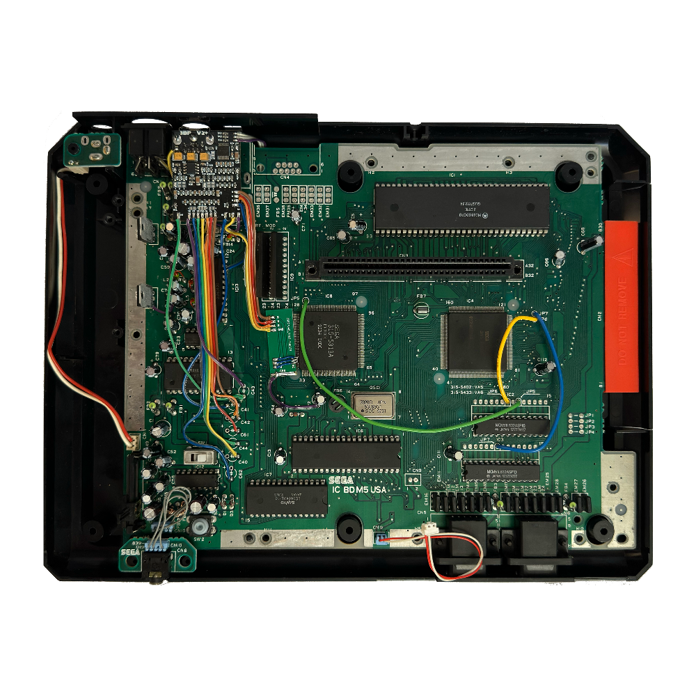 SEGA Genesis Model 1 with top cover removed and Triple Bypass RGB upgrade